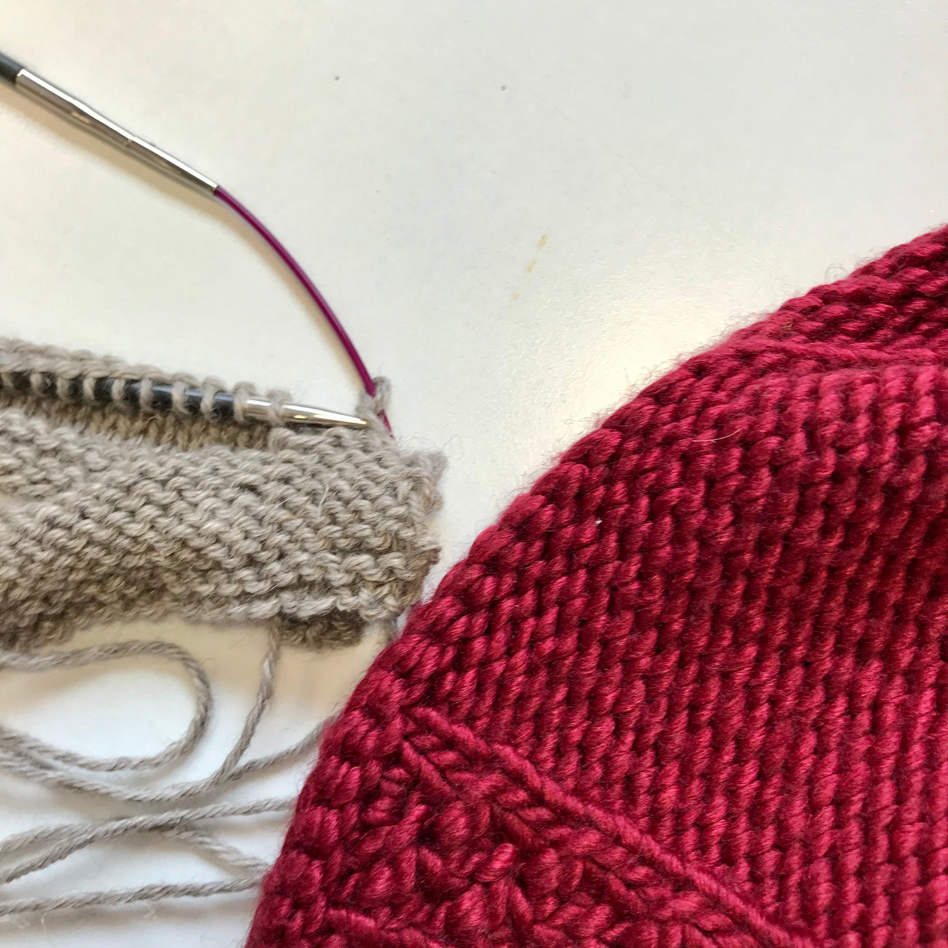 image of taupo and three needle bind off swatch being knit.