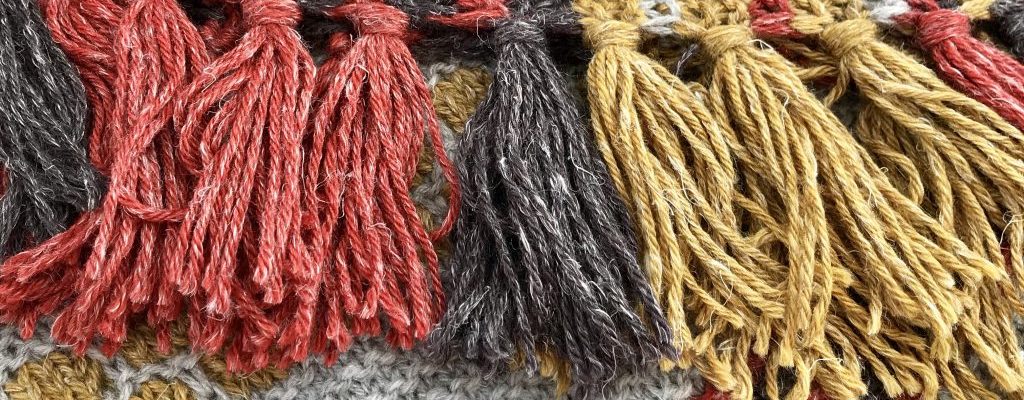 Knit Basics: How to Work a Knitted Fringe and Weave in Yarn Ends