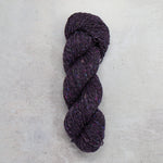 Purple yarn with flecks of colours