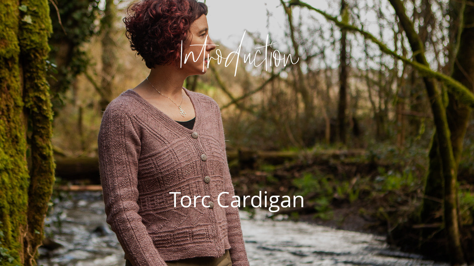 image ofo woman in woods wearing pink torc cardigan